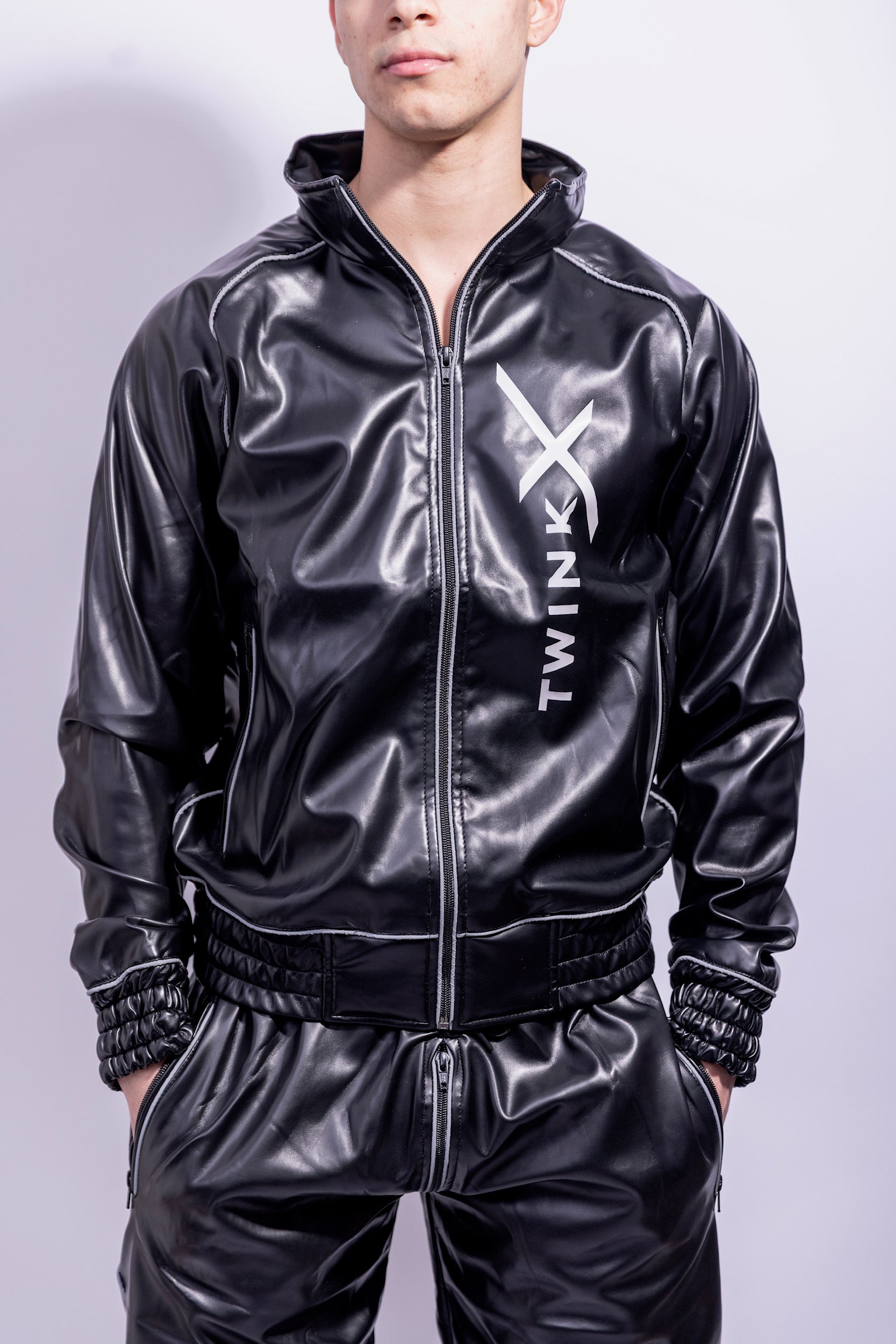x frame jacket I black/reflective I vegan leather